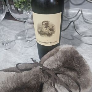 The Napa Valley Reserve 2018 Wine with Brown Fur Bag